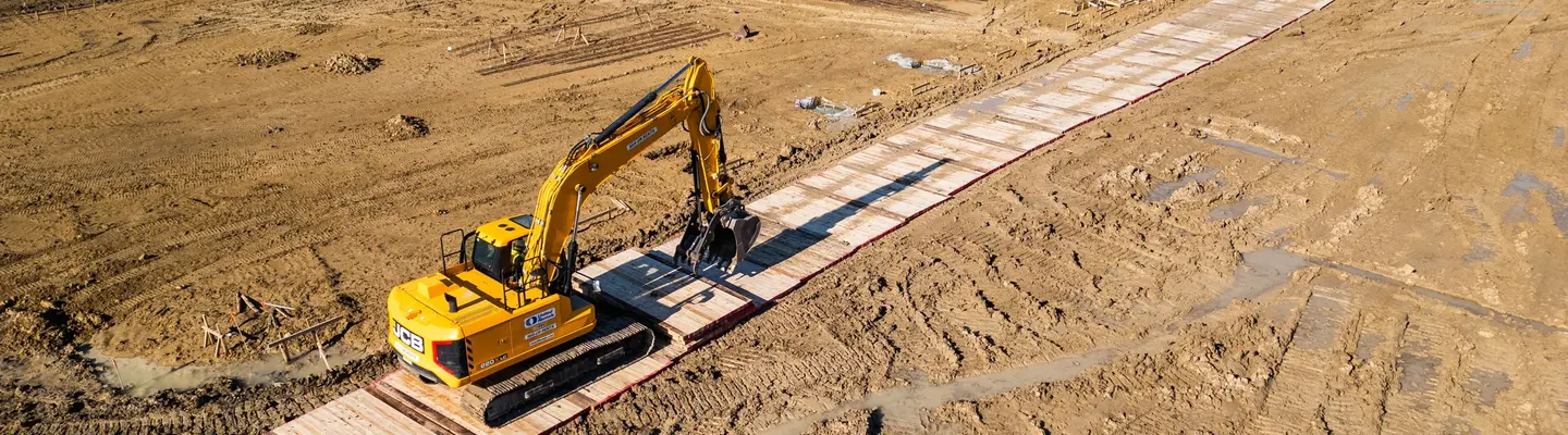 Installing mats on a jobsite