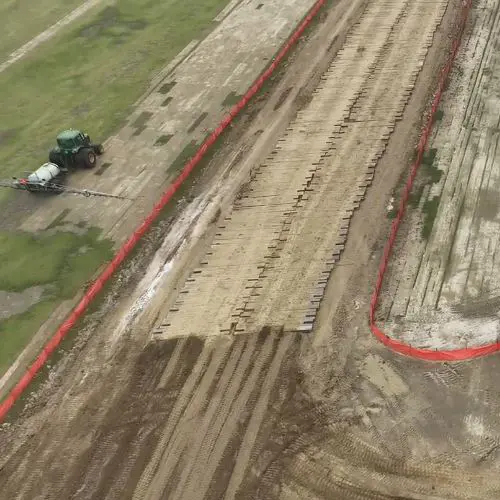 Timber mats at muddy jobsite