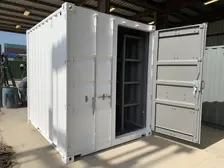 white shipping container with one door open
