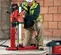 Red and black Hilti concrete core drill vacuum pump assembly