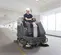 Gray Nilfisk 48 inch electric powered Ride-on Floor Scrubber