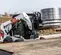 White, black and orange BOBCAT 1,700-1,900 lb. Skid Steer