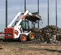 White, black and orange BOBCAT 1,700-1,900 lb. Skid Steer