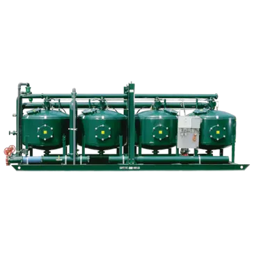 four green cylindrical tanks 