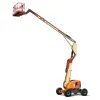 Beige and orange JLG articulating boom lift