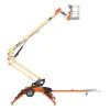 Beige and orange electric towable boom lift